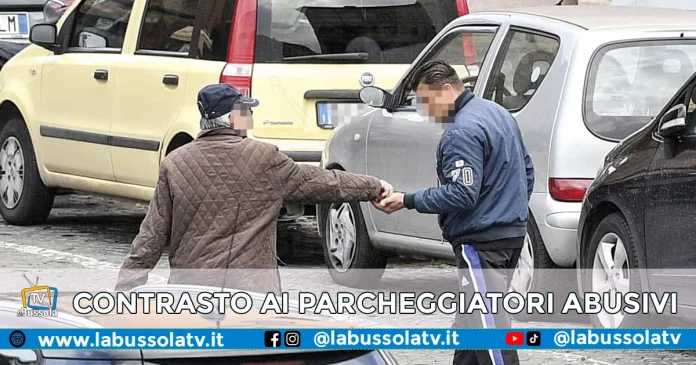 PARCHEGGIATORI ABUSIVI